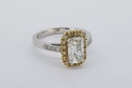 Emerald Cut Diamond Halo Ring, claw set emerald cut diamond approximately 1.14ct, surrounded by a