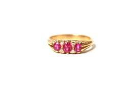 Ruby and Diamond Three Stone Carved Half Hoop Ring, three round cut rubies with diamond set