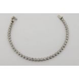Diamond Tennis Bracelet, bezel set with 44 diamonds, estimated total of 4.00ct, white gold, push