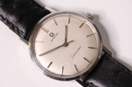 VINTAGE OMEGA SEAMASTER DRESS WATCH, circular dial, silver baton hour markers, 34mm stainless