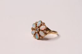 *TO BE SOLD WITHOUT RESERVE*An 18ct Opal & Diamond Dress Ring