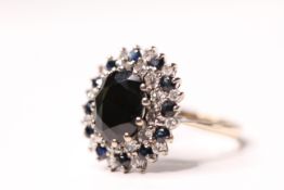 *TO BE SOLD WITHOUT RESERVE*An 18ct Gold Sapphire & Diamond Set Ring, Oval Cut Sapphire