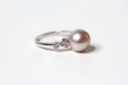 Pink South Sea Pearl & Diamond Ring, set with 1 round cultured pink pearl and 8 round brilliant