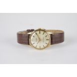 GENTLEMENS TUDOR 9CT GOLD WRISTWATCH, circular patina dial with hour markers and hands, 32mm 9ct