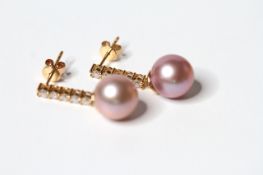 Pair Of Pink Pearl & Diamond Earrings, set with 2 round cultured south sea pearls and 10 round