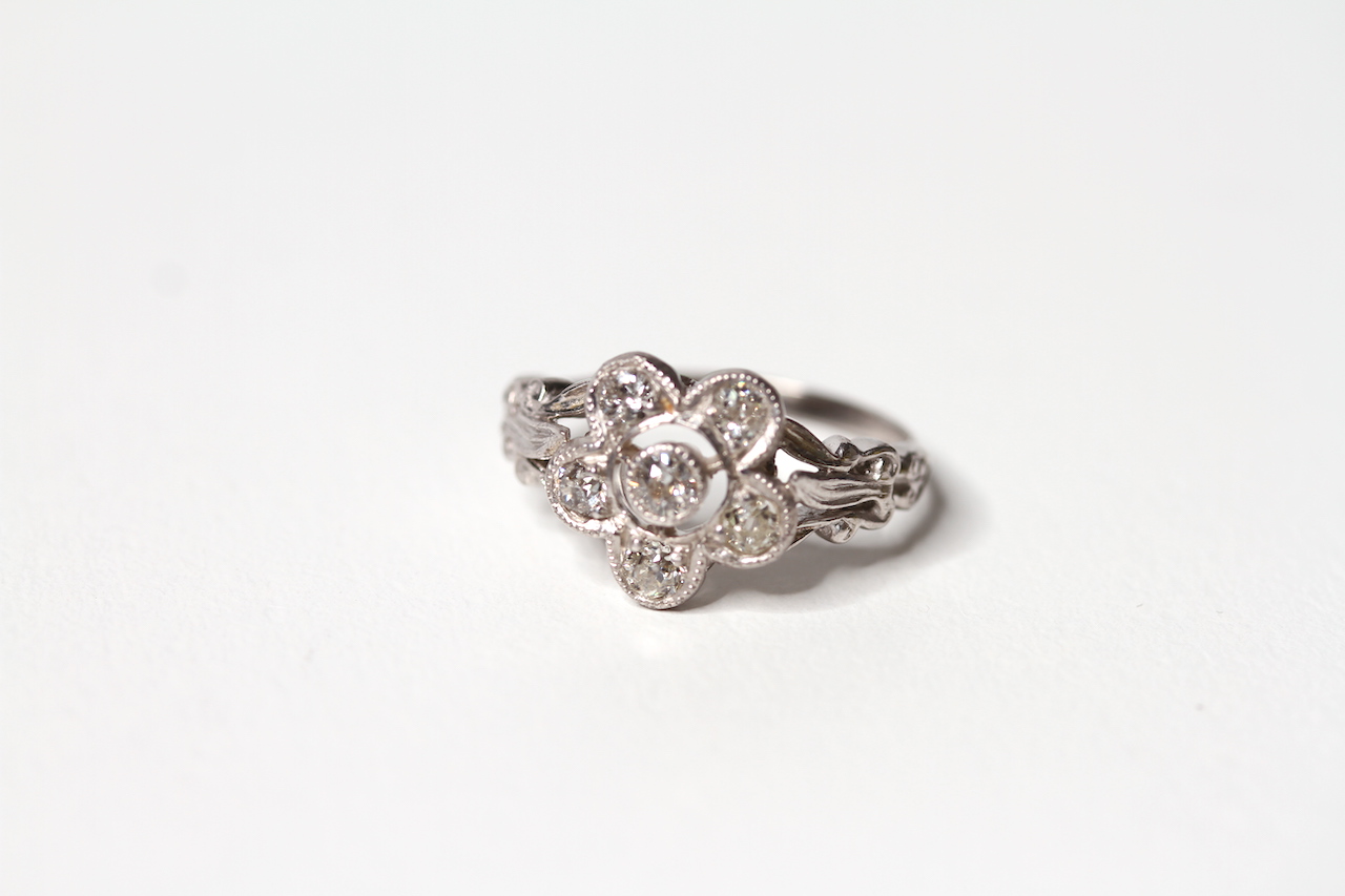 Old Cut Diamond Daisy Cluster Ring, 6 old cut diamonds, estimated total diamond weight 0.60ct, split