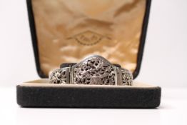 *TO BE SOLD WITHOUT RESERVE*Vintage silver oriental cutwork story panel bracelet boxed