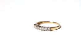 Diamond 7 stone ring, estimated total diamond weight 0.25ct, in 9ct yellow and white gold