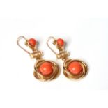 Coral and Pearl Drop Earrings, cabochon cut coral, within a gold twist, suspended from peal and