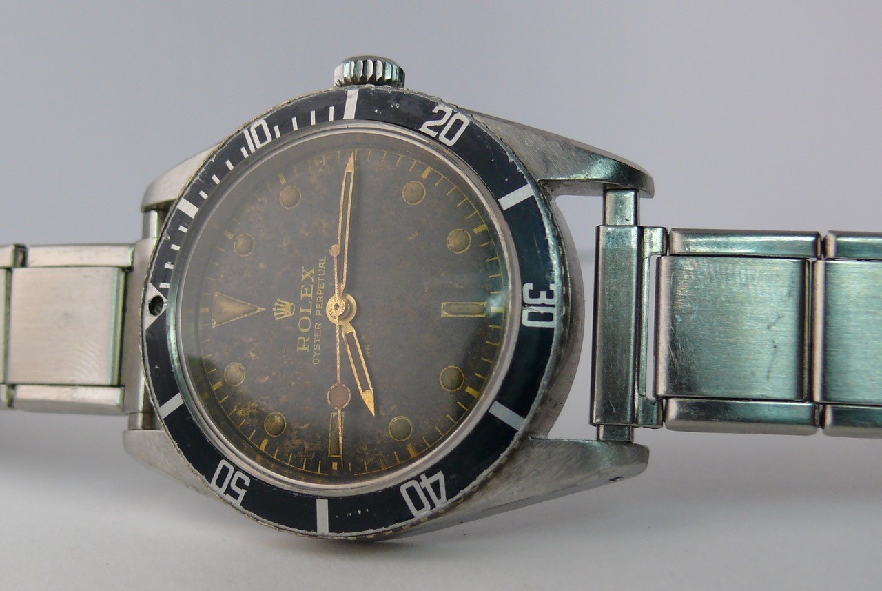 Vintage Early Rolex Submariner BREVET + 6205. Both numbers clearly legible. Original dial and