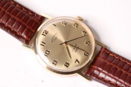 VINTAGE 9CT ROTARY CIRCA 1976, circular gilt dial, Arabic numerals, 32mm 9ct gold case, 17 jewel