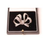 5.70ct Diamond Bow Brooch, large diamond set bow, 48x39mm, pin and safety catch fitting, mounted