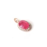 Natural Ruby & Diamond Pendant, set with 1 oval cut natural ruby and 18 round brilliant cut