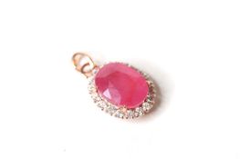 Natural Ruby & Diamond Pendant, set with 1 oval cut natural ruby and 18 round brilliant cut