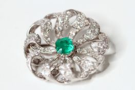 Fine Art Deco Emerald and Diamond Spray Brooch, central cushion cut emerald, approximately 6mm