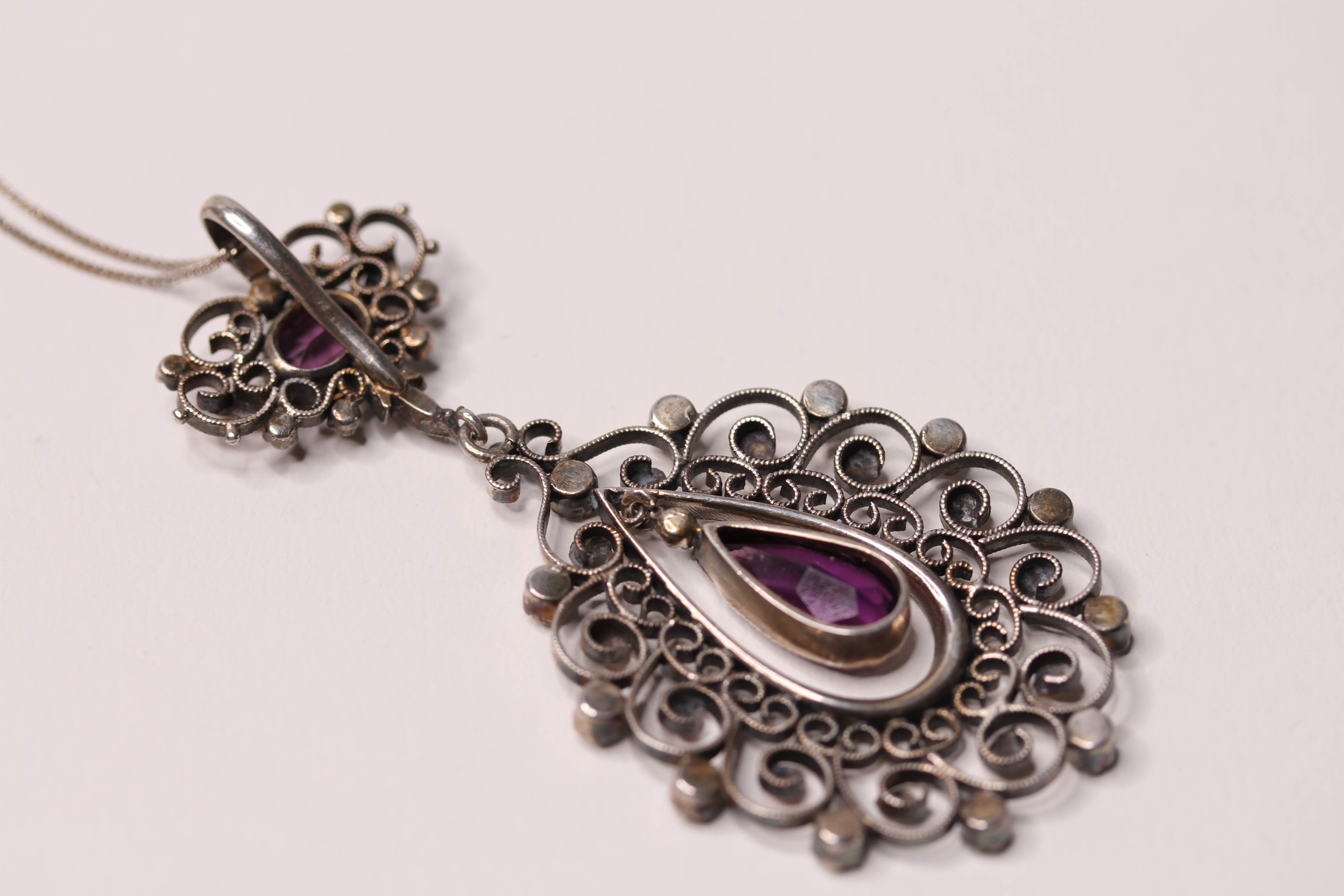 *TO BE SOLD WITHOUT RESERVE*An Antique unmarked silver amethyst and marcasite drop pendant, with - Image 2 of 2
