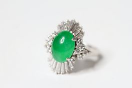 Jade and Diamond cocktail ring, cabochon green jade centre, brilliant and tapered baguette cut