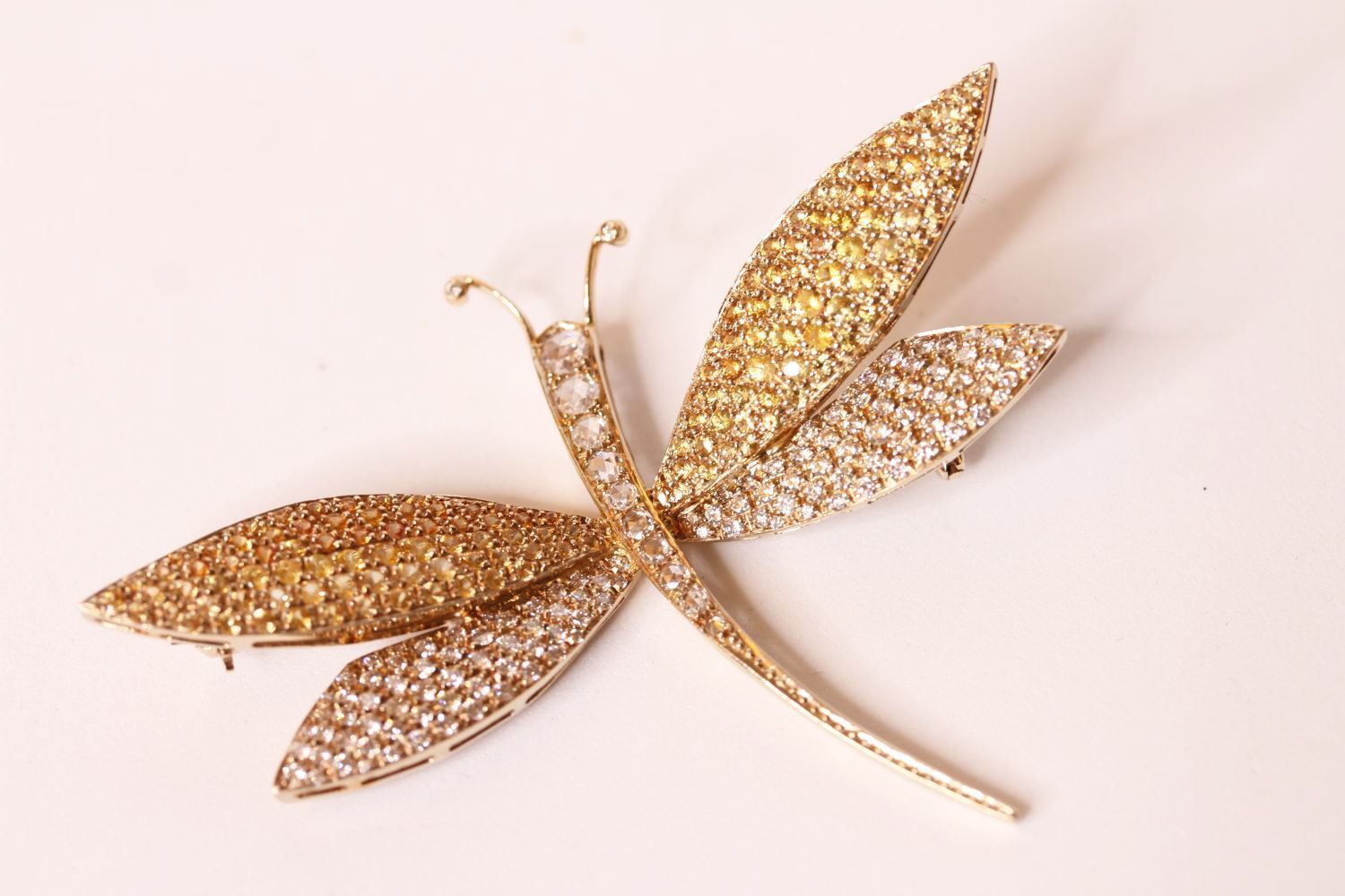 Dragonfly Brooch, pave set with diamonds and yellow sapphires, 67mm x 53mm at widest points, total