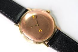 STERILE BRONZE EFFECT DIAL WRIST WATCH, circular bronze effect dial, yellow seconds hand with moon