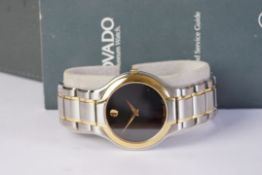 GENTLEMENS MOVADO QUARTZ WRISTWATCH W/ BOX & BOOKLET, circular black dial with dauphine hands,