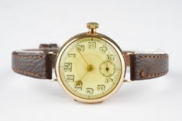 GENTLEMENS 9CT GOLD TRENCH STYLE WRISTWATCH CIRCA 1918, circular white dial although appears