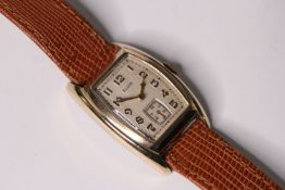 VINTAGE ELGIN ART DECO DRESS WATCH, cushion dial with gold roman numerals and hands, subsidiary