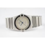 MID SIZE OMEGA CONSTELLATION DATE WRISTWATCH, circular silver dial with dot hour markers and