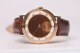 1940s 14CT LONGINES WRIST WATCH, circular cream and bronze dial with arabic numerals, subsidiary