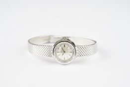LADIES OMEGA 18CT WHITE GOLD COCKTAIL WATCH, circular silver dial with stick hour markers and hands,
