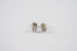 18CT WHITE GOLD DIAMOND STUD EARRINGS, 18ct white gold studs set with 0.3pt diamonds each.*** Please