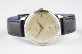 GENTLEMENS ZENITH JUMBO WRISTWATCH, circular patina dial with applied gold hour markers and hands,