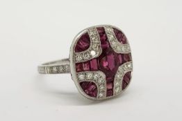 Ruby & Diamond Cross Design Dress Ring, central oval cut ruby estimated 0.64ct, diamond set