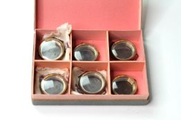 VINTAGE ROLEX CASE BOX INCLUDING 6 NOS ROLEX TRENCH WATCH CASES AND 3 PERIOD LILEN POUCHES, 33mm gun