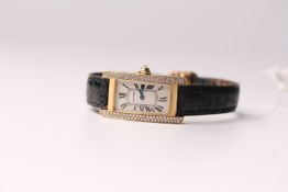 LADIES 18K DIAMOND SET CARTIER AMERICAINE , MODEL 1710,oblong dial, beige face with blue hands,