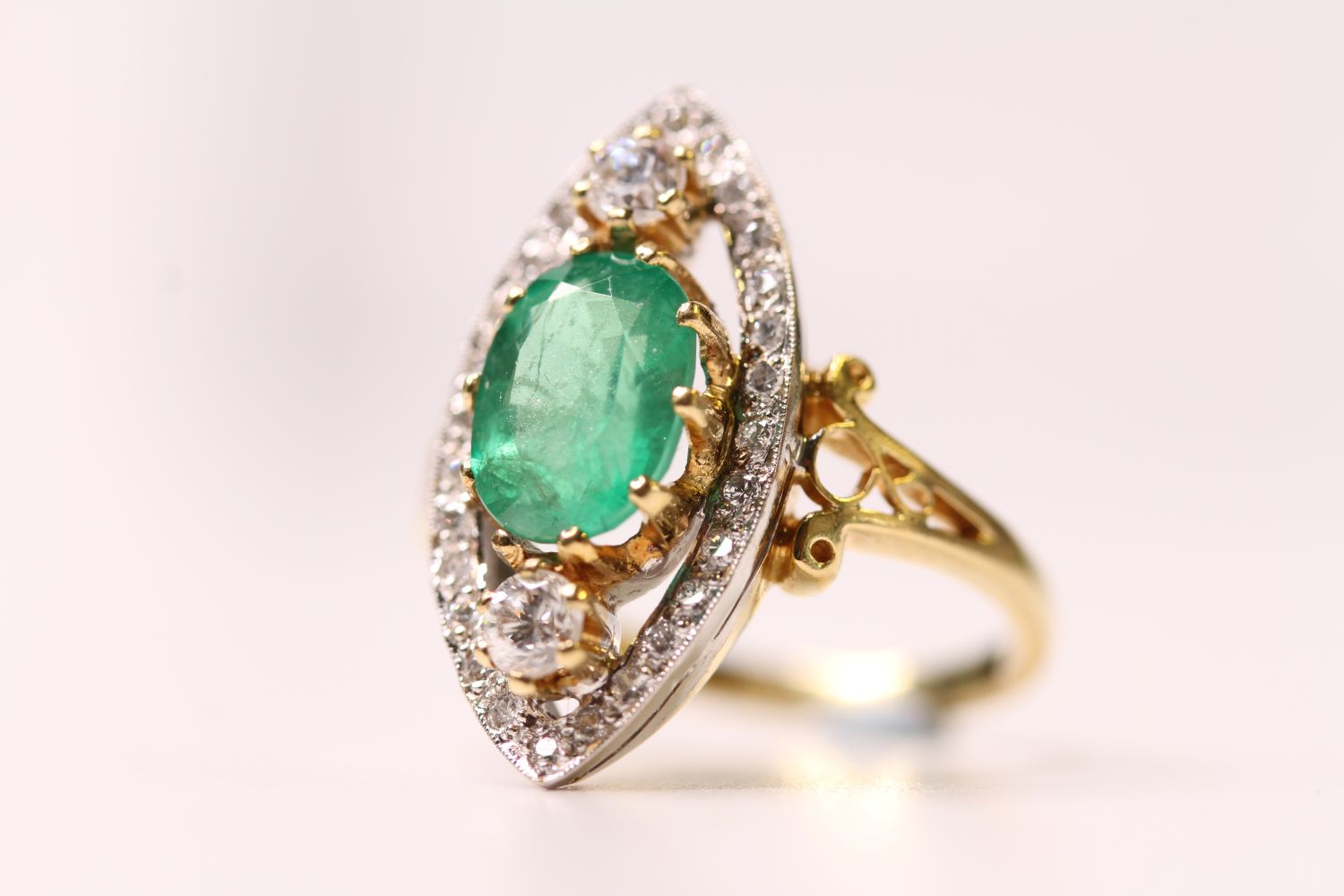 Emerald & Diamond Marquise Shaped Ring, set with a central oval emerald inside a diamond open - Image 2 of 4