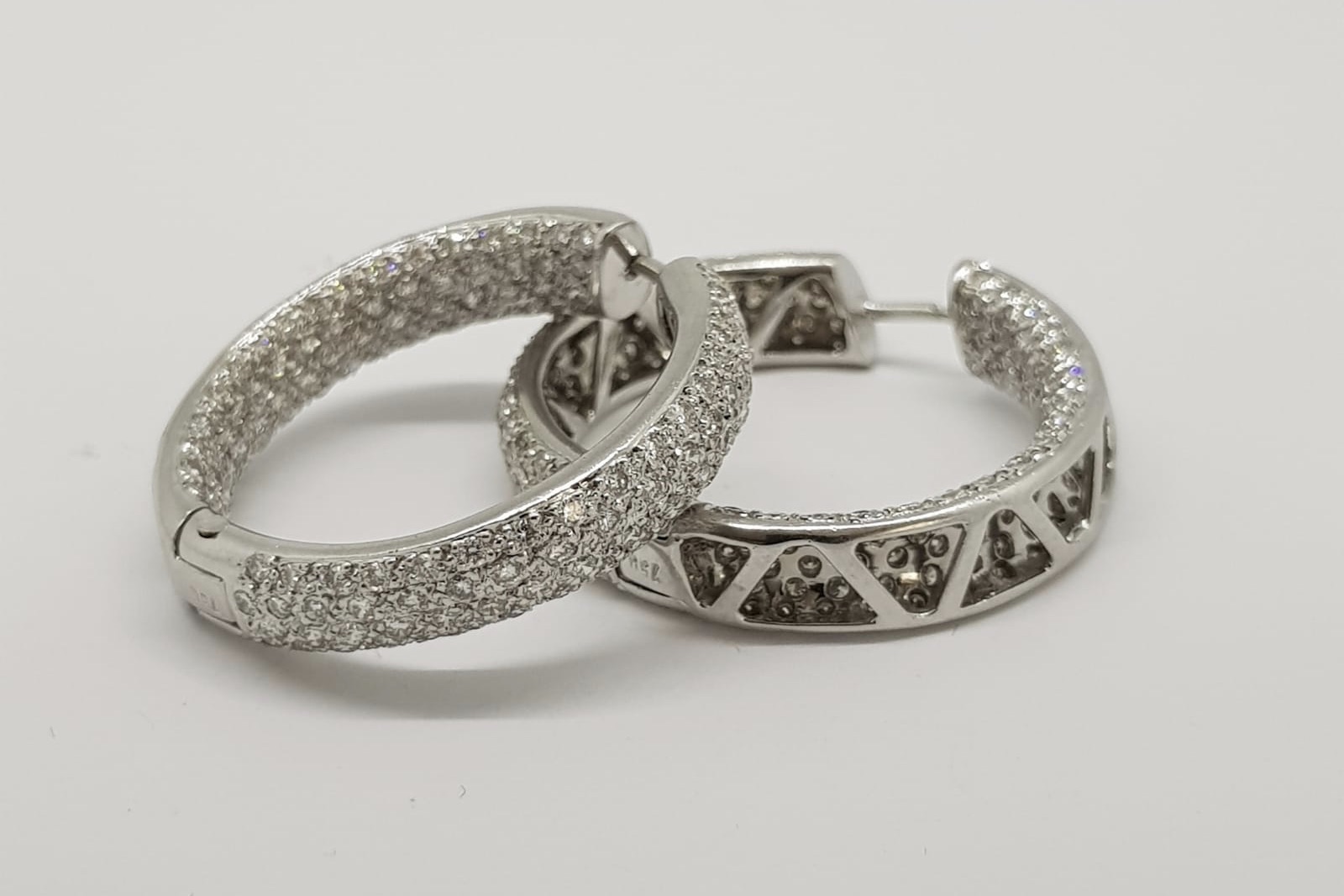 Pair Of Pave Set Diamond Hoop Earrings, with full circle illusion for pierced ears, they are