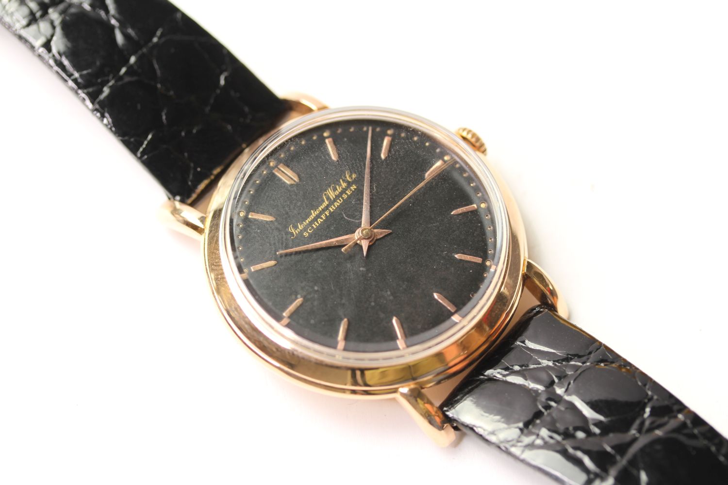 VINTAGE 18CT ROSE GOLD IWC SCHAFFHAUSEN DRESS WATCH, circular black dial, rose gold hour markers and