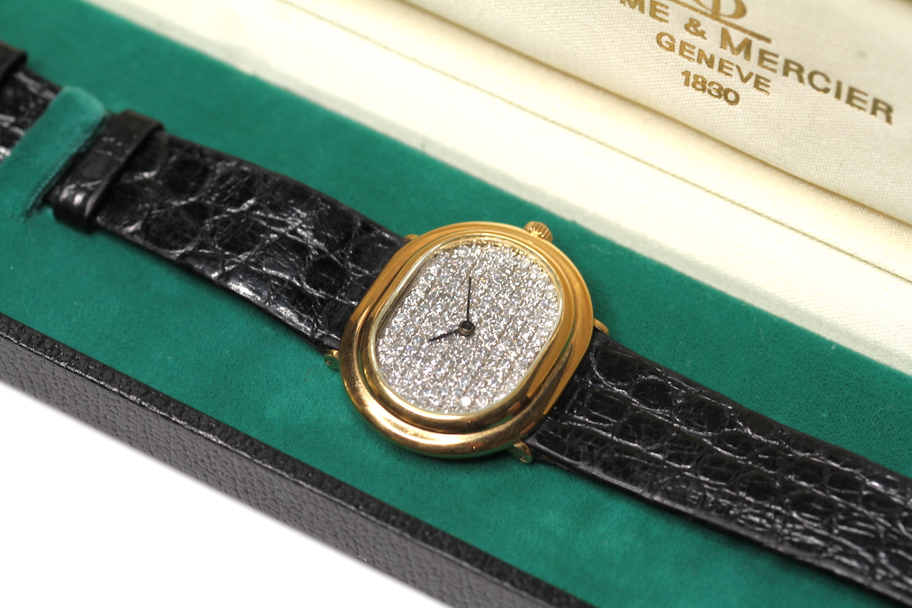 VINTAGE 18CT BAUME & MERCIER WRIST WATCH DIAMOND DIAL WITH BOX AND ORIGINAL RECEIPT, oval shaped