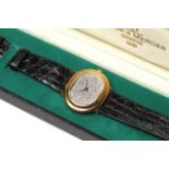 VINTAGE 18CT BAUME & MERCIER WRIST WATCH DIAMOND DIAL WITH BOX AND ORIGINAL RECEIPT, oval shaped