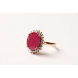 Ruby & Diamond Cluster Ring, set with an oval cut natural ruby 3.36ct, surrounded by 22 round