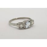 Aquamarine & Diamond 3 Stone Ring, set with an aquamarine approximately 0.80ct, total approximate