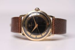 1950s WITTNAUER WRISTWATCH, circular black quartered dial with 10ct yellow gold filled inner