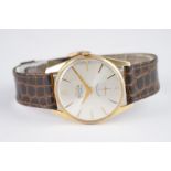 GENTLEMENS ROYCE GOLD PLATED WRISTWATCH CIRCA 1950, circular silver dial with applied gold hour