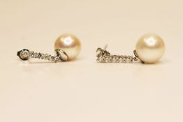 Pair Of Pearl & Diamond Earrings, set with 2 round cultured pearls, 10 round brilliant cut