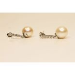 Pair Of Pearl & Diamond Earrings, set with 2 round cultured pearls, 10 round brilliant cut
