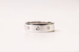 Diamond Set 5mm Wide Band Ring, stamped 18ct white gold, set with interspersed diamonds, finger size