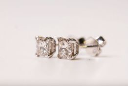 Pair of Princess Cut Diamond Stud Earrings, 4 claw set, stamped 18ct white gold, with round backs,