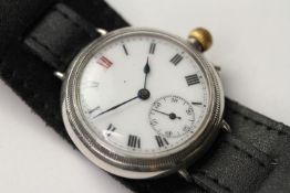 SILVER CASED TRENCH WATCH, white dial with red twelve hour markers, Roman numerals, onion crown,