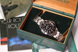 VINTAGE ROLEX GMT MASTER REFERENCE 16750 WITH BOX AND ROLEX SERVICE CARD, circular black dial with