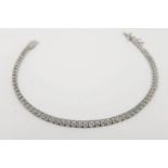 Diamond Line Bracelet, set with 70 brilliant cut diamonds, claw set, push button opening tongue